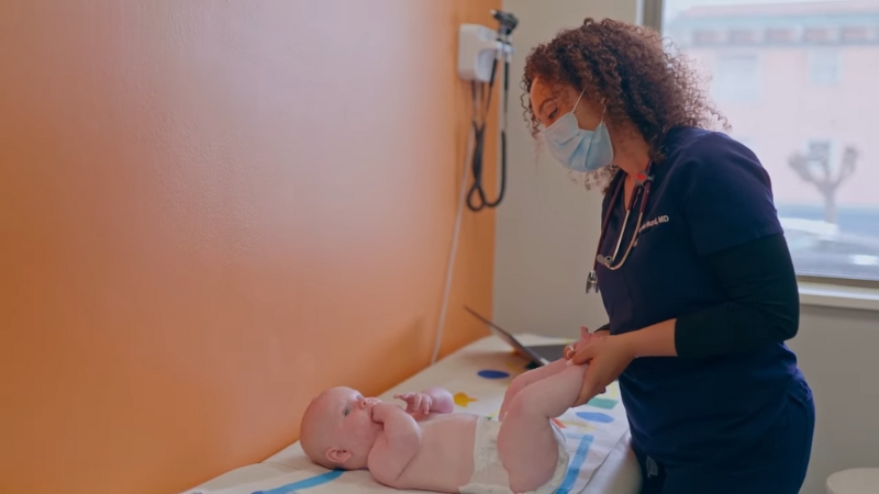 A Pediatrician Examining a Baby During a Check-Up in A Clinic